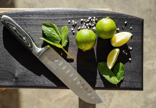 Handmade dark oak charcuterie serving board with hand-torched finish, crafted in Lancashire by Made at Montrose 