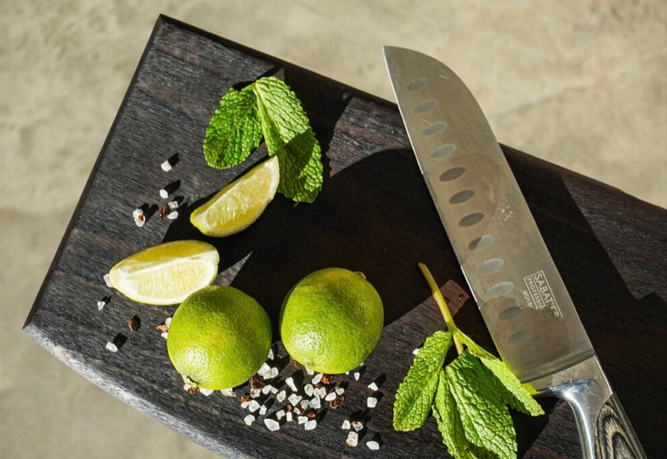 Handmade dark oak charcuterie board shown from another angle, featuring its natural wood grain and hand-torched finish