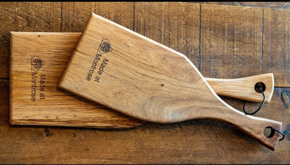Handmade wooden serving boards with natural hardwood grain and Made at Montrose branding, handcrafted in Lancashire.