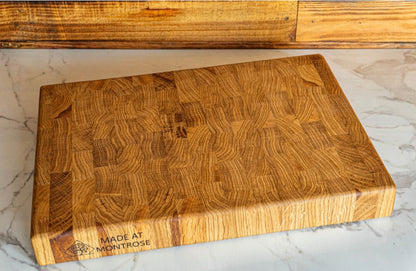 Montrose Edition solid oak end grain chopping board showing the natural oak grain, smooth surface and thick hardwood construction.